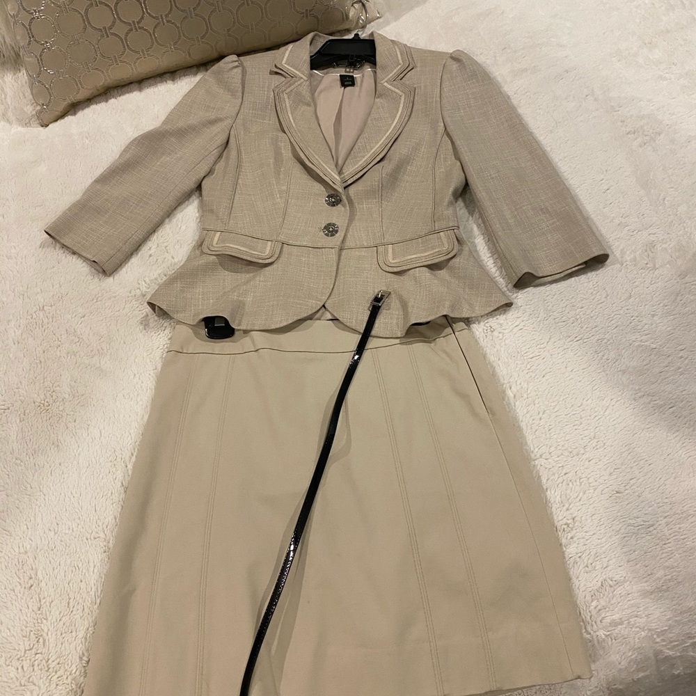 Two piece women’s skirt suit.